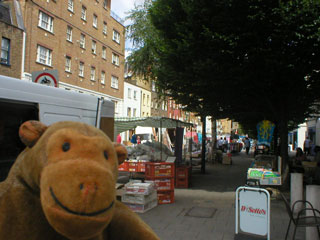 Mr Monkey looking at Chalton Street market
