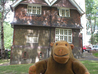 Mr Monkey with the gatekeeper's cottage