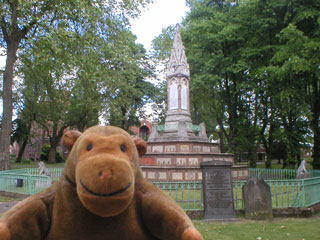 Mr Monkey looking at the Burdett-Coutts memorial sundial