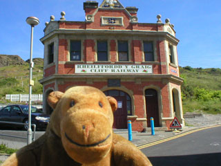 Mr Monkey outside the Cliff Railway building