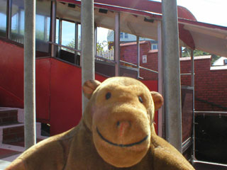 Mr Monkey examining one of the Cliff Railway trains