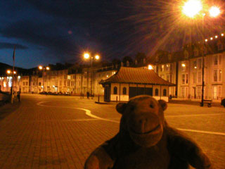 Mr Monkey on the promenade at night