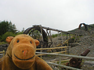 Mr Monkey examining a pair of waterwheels
