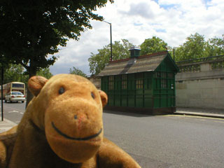 Mr Monkey across the road from a cabman's shelter