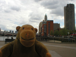 Mr Monkey walking towards the OXO Tower