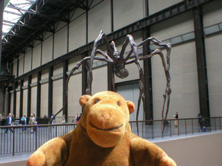 Mr Monkey with a giant spider sculpture