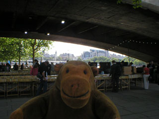 Mr Monkey at the used book stalls under Waterloo Bridge