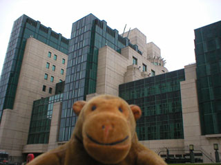 Mr Monkey looking up at the MI6 building