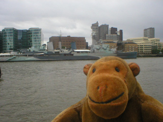 Mr Monkey looking across the Thames at HMS Belfast