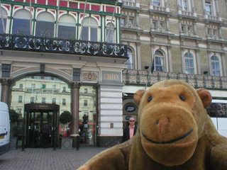 Mr Monkey in front Charing Cross hotel and station