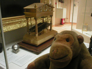 Mr Monkey with some odd clocks