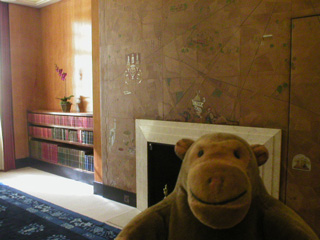 Mr Monkey with the leather map in the boudoir