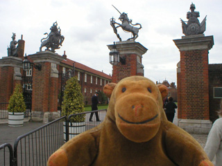 Mr Monkey outside some ornate gates