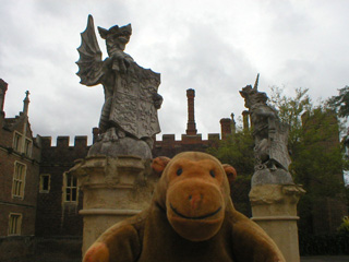 Mr Monkey examining stone beasts