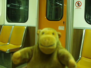 Mr Monkey in a subway carriage