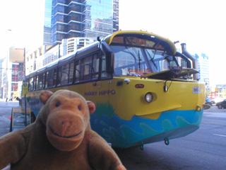 Mr Monkey in front of a Hippo amphibious bus