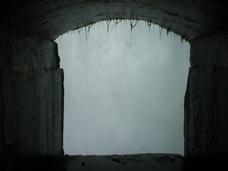 The mouth of a tunnel opening beind the Horseshoe Falls