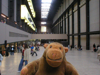 Mr Monkey listening in the Turbine Hall