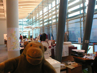 Mr Monkey entering an office at Urbis