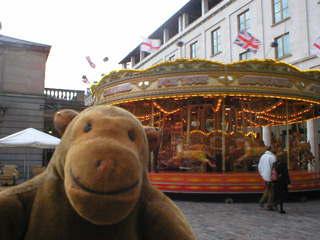 Mr Monkey next to a roundabout