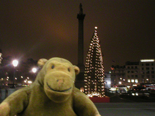Mr Monkey in Trafalgar Square at night