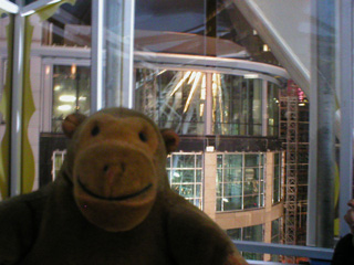 Mr Monkey passing the front of Selfridges