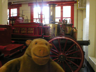Mr Monkey with a horse drawn fire engine
