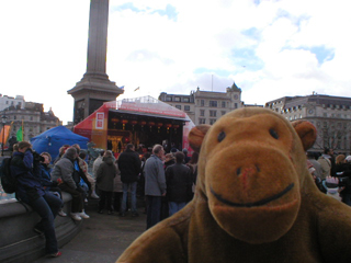 Mr Monkey watching the stage in Trafalgar Square