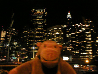 Mr Monkey looking at Manhattan offices by night