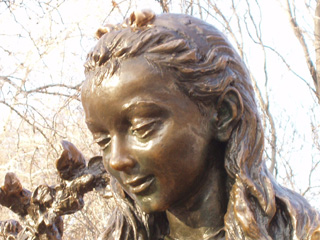 Close up of the Alice in Wonderland statue