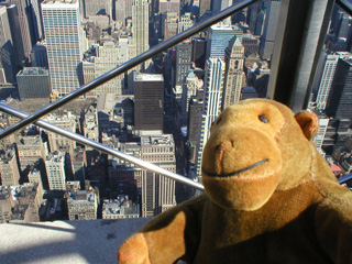 Mr Monkey looking down into Midtown Manhattan