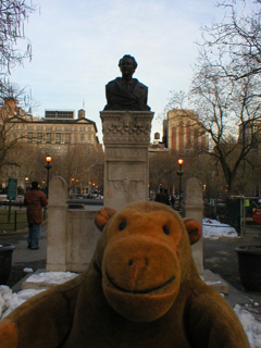 Mr Monkey looking down on the houses opposite