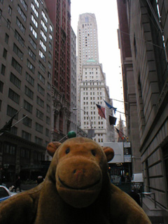 Mr Monkey looking north on Wall Street