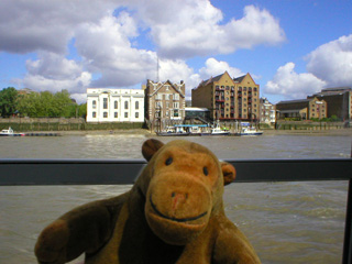 Mr Monkey passing Wapping Police Station