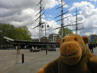 Mr Monkey walking towards the Cutty Sark