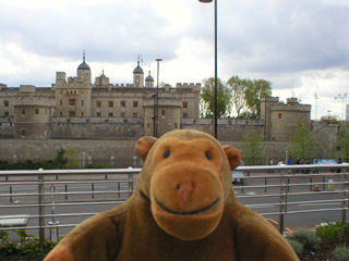 Mr Monkey looking at the Tower of London from Tower Hill