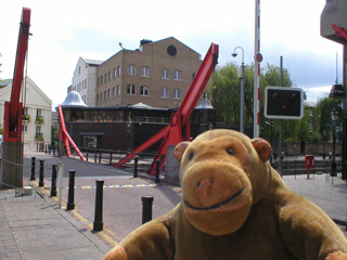 Mr Monkey by a bridge ove the entrance lock to St Katherine's Dock