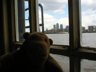 Mr Monkey looking out of the windows of The Prospect of Whitby