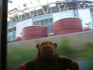 Mr Monkey passing the Wembley Stadium construction site