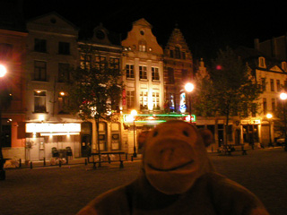 Mr Monkey outside Ste Catherine's church in the night
