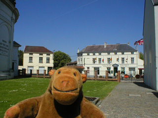 Mr Monkey walking between the Panorama and the Visitor Centre