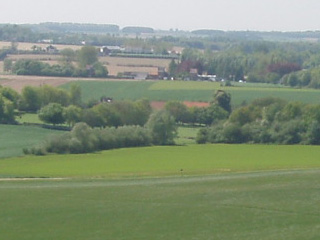 The roof of Hougoumont surrounded by trees