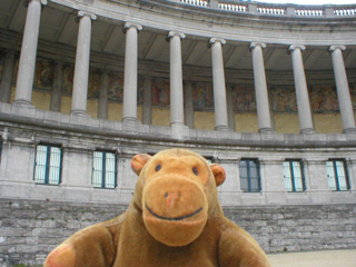 Mr Monkey looking up at the gallery of mosaics