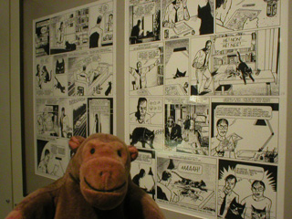 Mr Monkey with a display about drawing comic strip