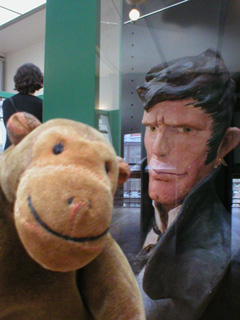 Mr Monkey with a bust of Corto Maltese