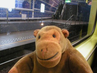 Mr Monkey looking out of a Premetro tram
