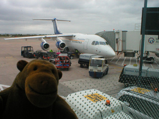 Mr Monkey looking at his plane at Manchester
