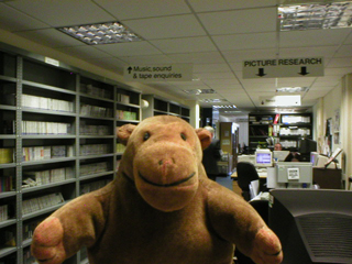 Mr Monkey in the archives office