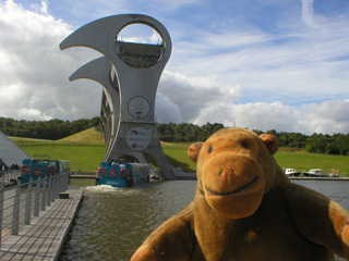 Mr Monkey watching a boat enter the wheel