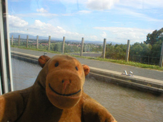 Mr Monkey looking from the aqueduct